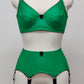 Green lingerie set with 6 strap Greta garter belt and full cup bra, on a mannequin against a gray background