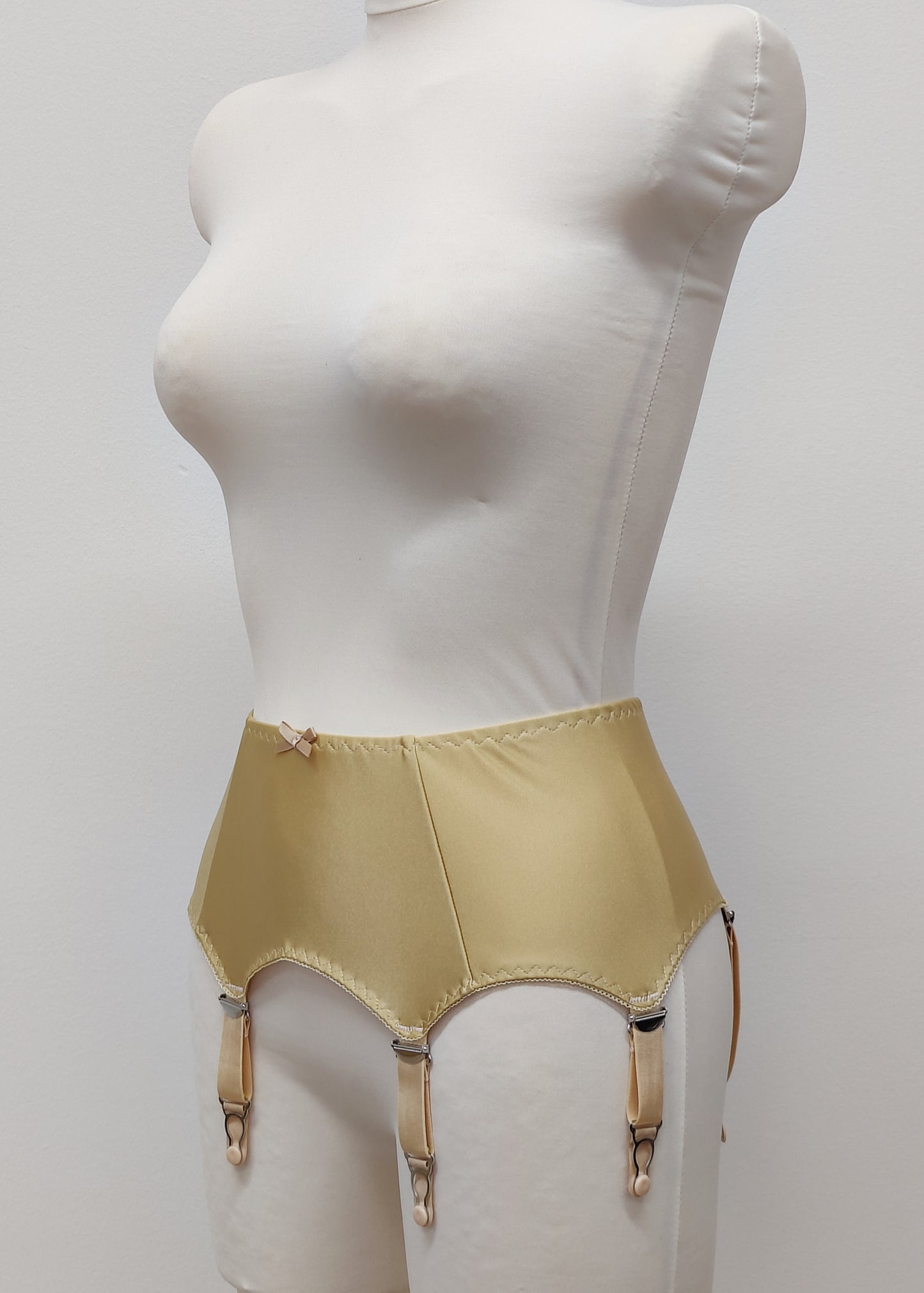 beige classic retro style  Greta garter belt with 6 straps, side view