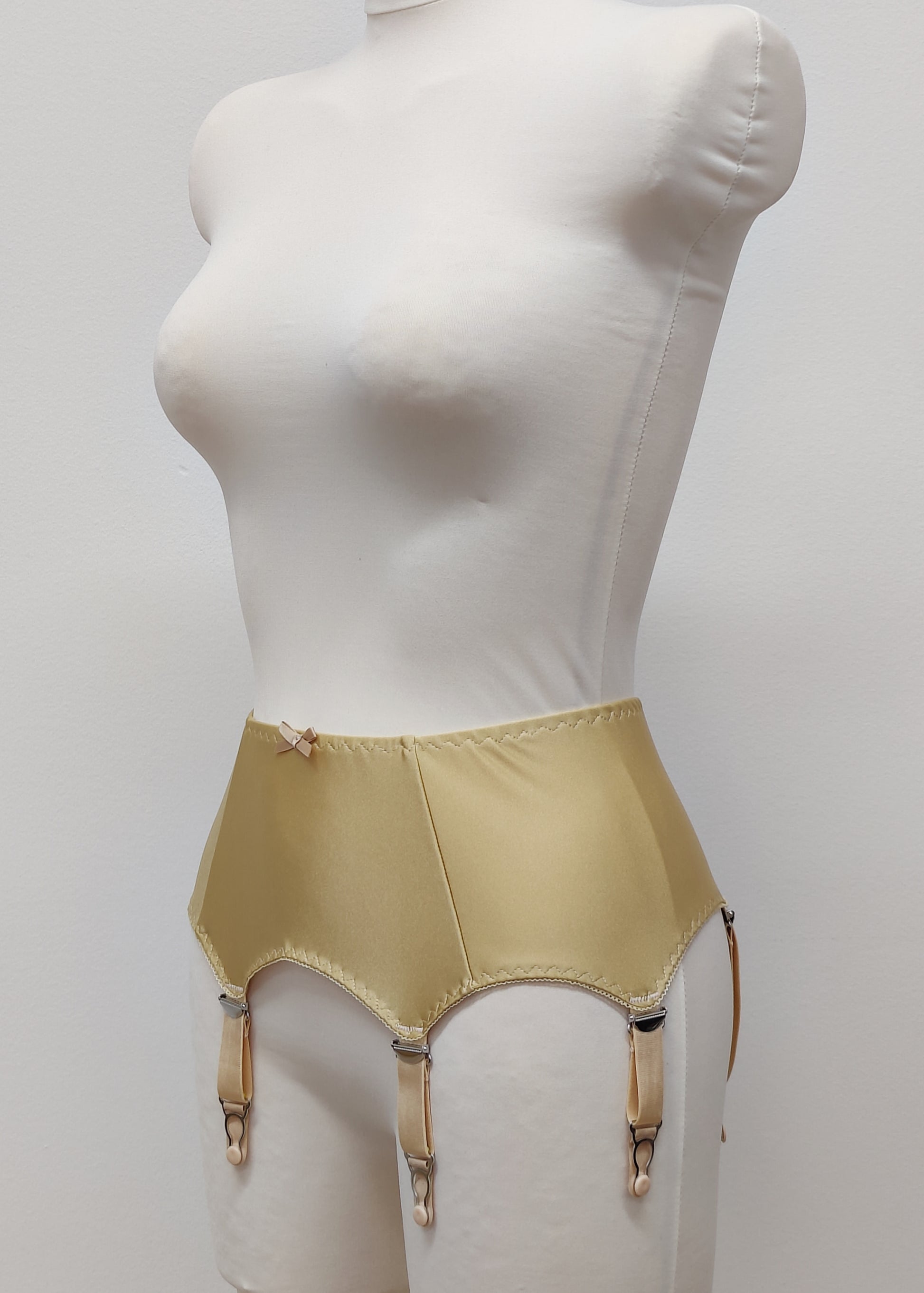 beige classic retro style  Greta garter belt with 6 straps, side view