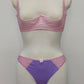 Mannequin wearing a  pink Gina quarter cup bra and  purple Mia thong with sheer pink side panels 
