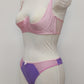 Mannequin wearing a  pink Gina quarter cup bra and  purple Mia thong with sheer pink side panels, side view 