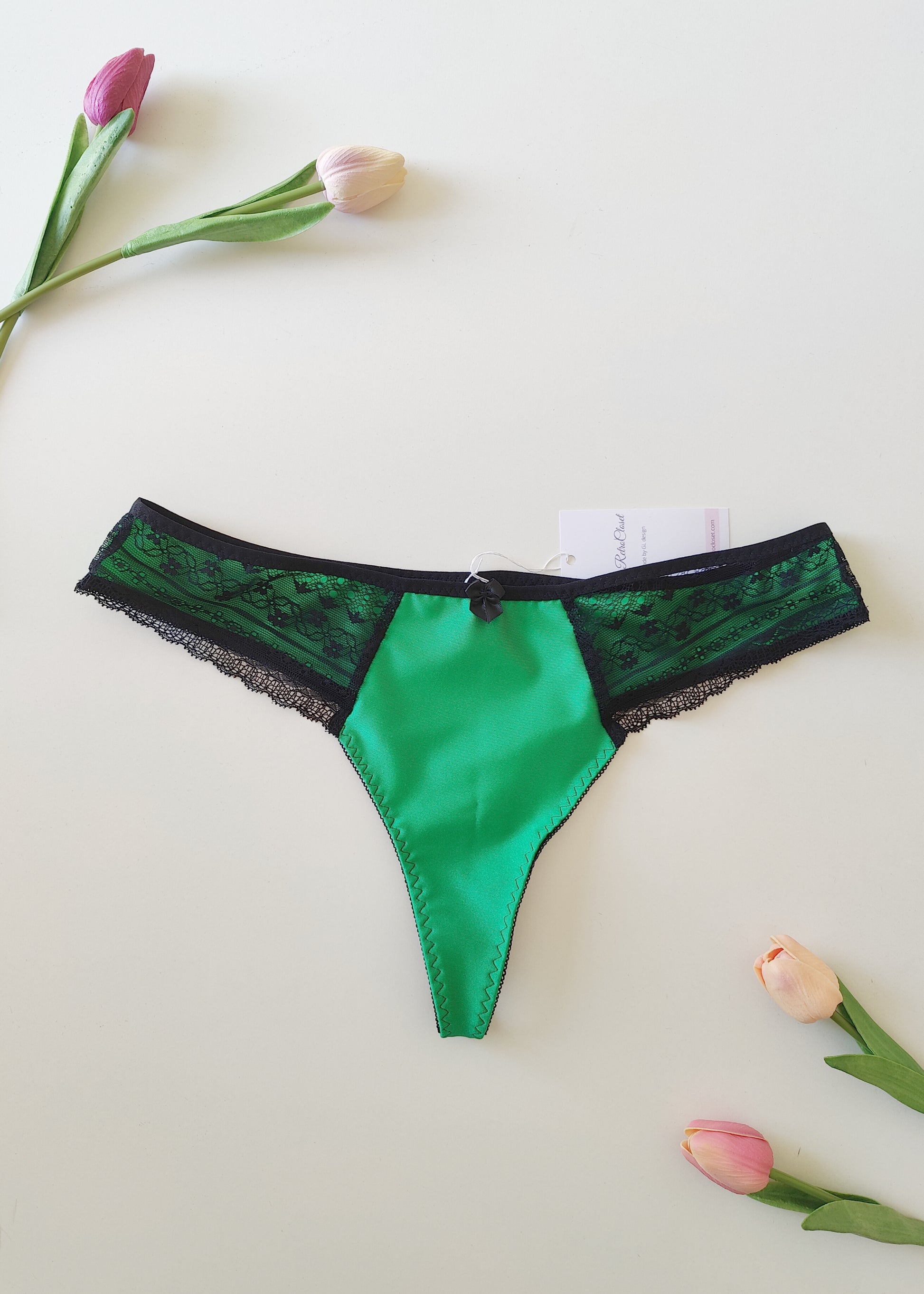 emerald green Zigi thong panties with black geometric lace on the front side panels