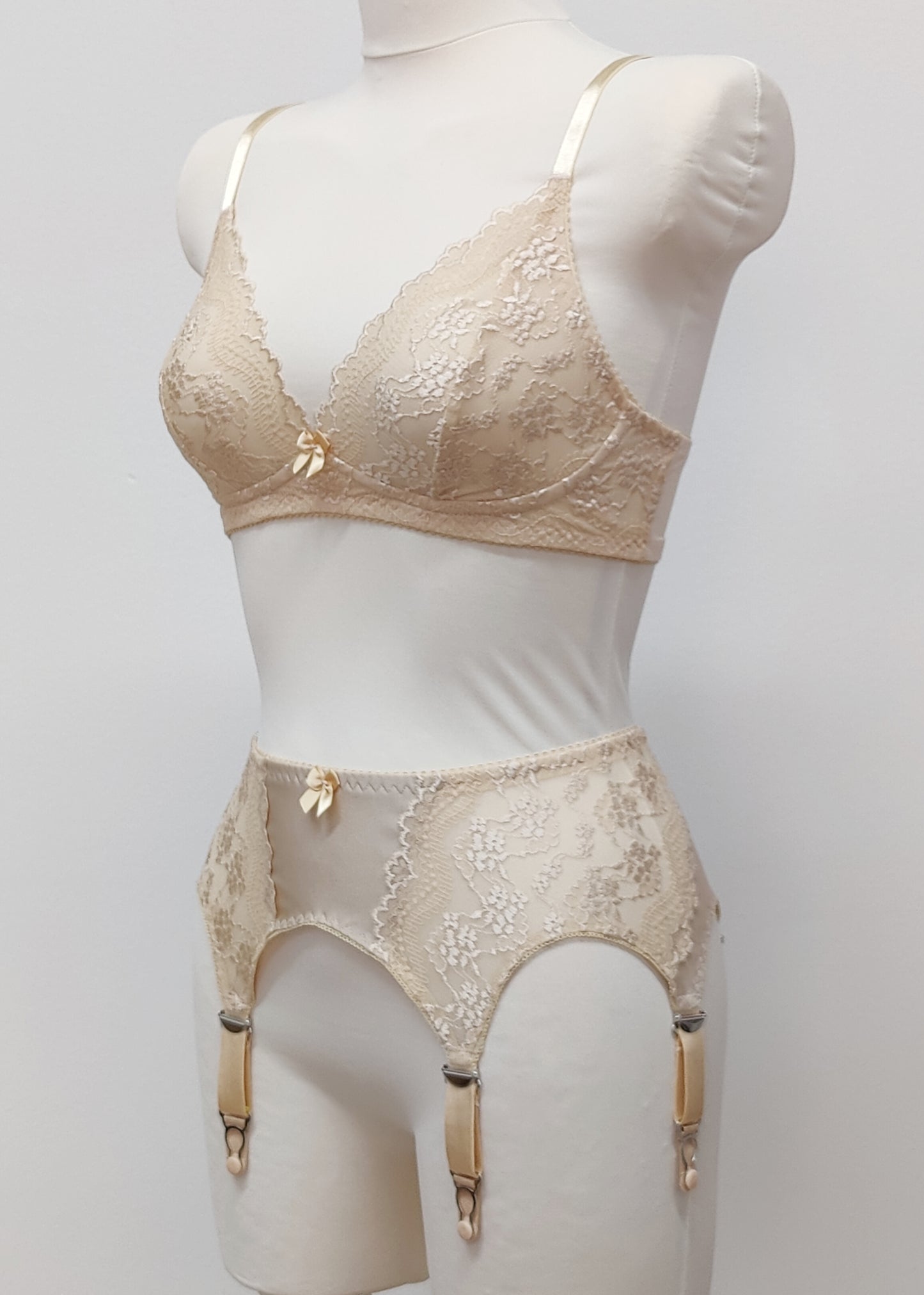 Beige lace 6 strap retro style Mona garter belt with side lace panels, shown with matching Coco bralette, side view