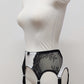 High waist Mona garter belt in white color with black lace side panels and 6 adjustable straps, side view