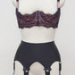 Black Iris garter belt with bows on the front straps, shown here with pink/black Lucrezia bra