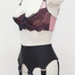 Black Iris garter belt with bows on the front straps, shown here with pink/black Lucrezia bra, side view
