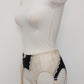 Black with beige lace 6 strap retro style Mona garter belt with side lace panels, side view