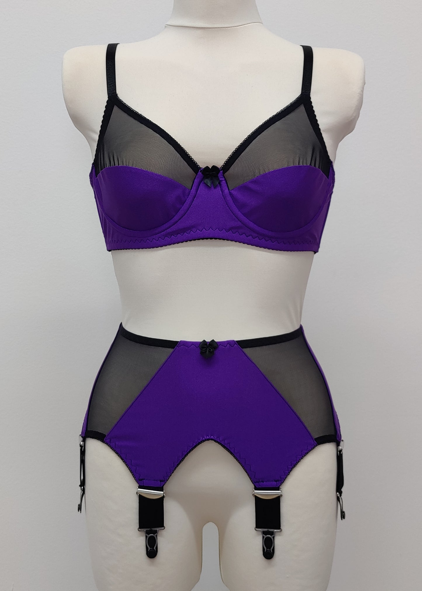 wide, vintage style, Grace garter belt, purple with black mesh panels and 6 extra wide straps, shown with matching Audrey soft cup bra