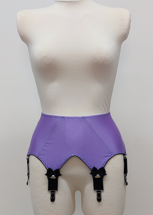 Lilac high-waisted garter belt with extra wide black straps and bows