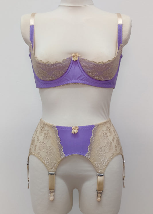Lilac with beige lace 6 strap retro style Mona garter belt with side lace panels, shown with matching Lucy quarter cup bra
