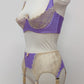 Lilac with beige lace 6 strap retro style Mona garter belt with side lace panels, shown with matching Lucy quarter cup bra, side view