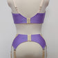 Lilac with beige lace 6 strap retro style Mona garter belt with side lace panels, shown with matching Lucy quarter cup bra, back view