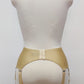 Beige high-waisted garter belt with lace side panels and hanging suspenders, displayed on a white mannequin torso against a light gray background.