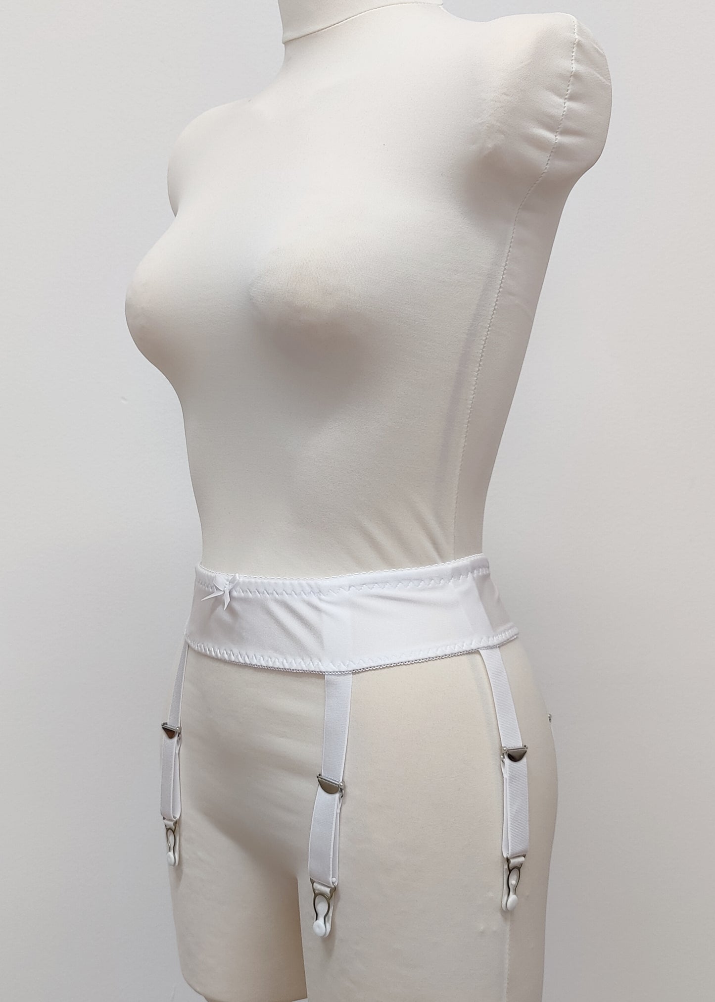 white narrow 60's style Summer garter belt with 6 straps, side view