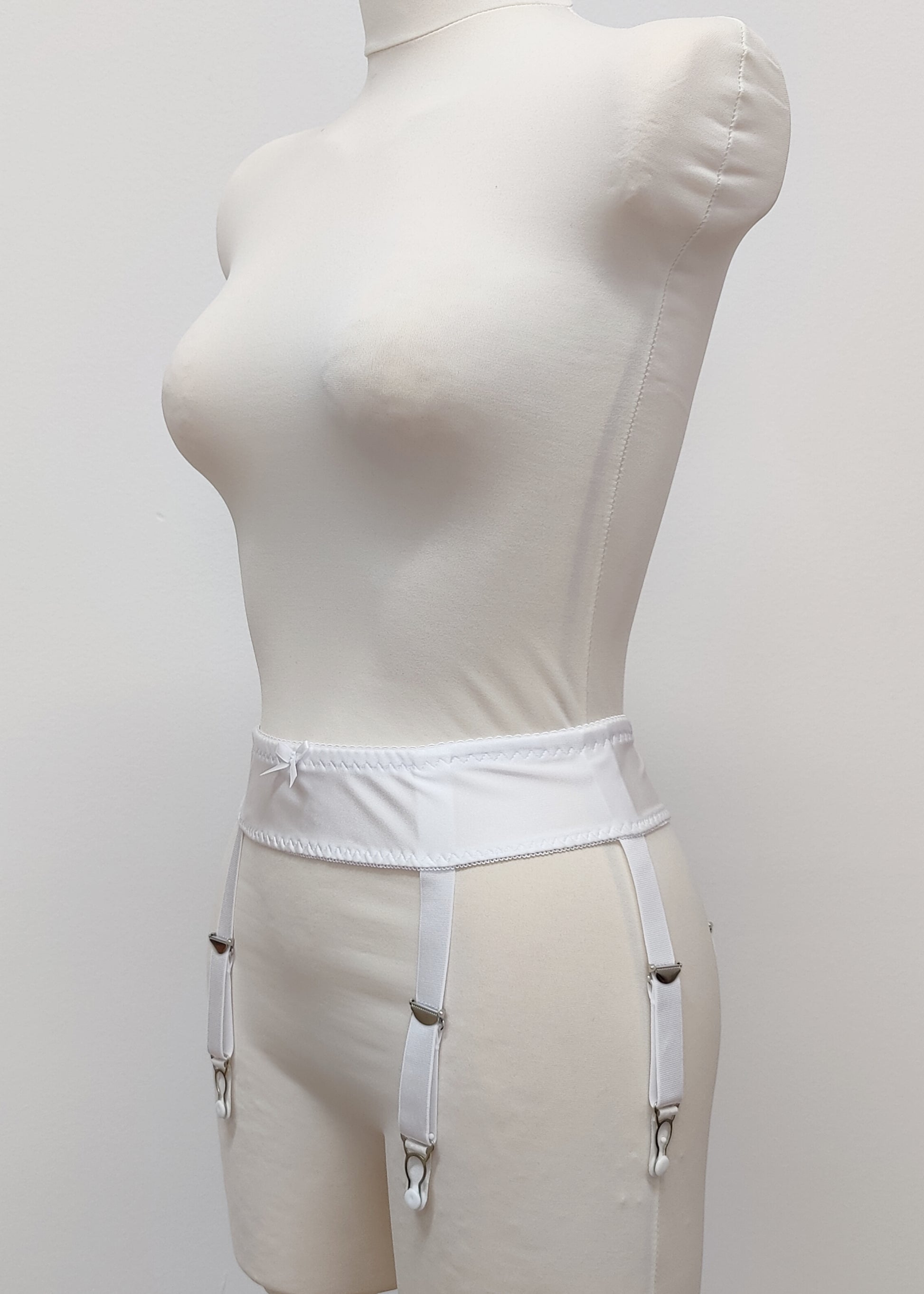 white narrow 60's style Summer garter belt with 6 straps, side view