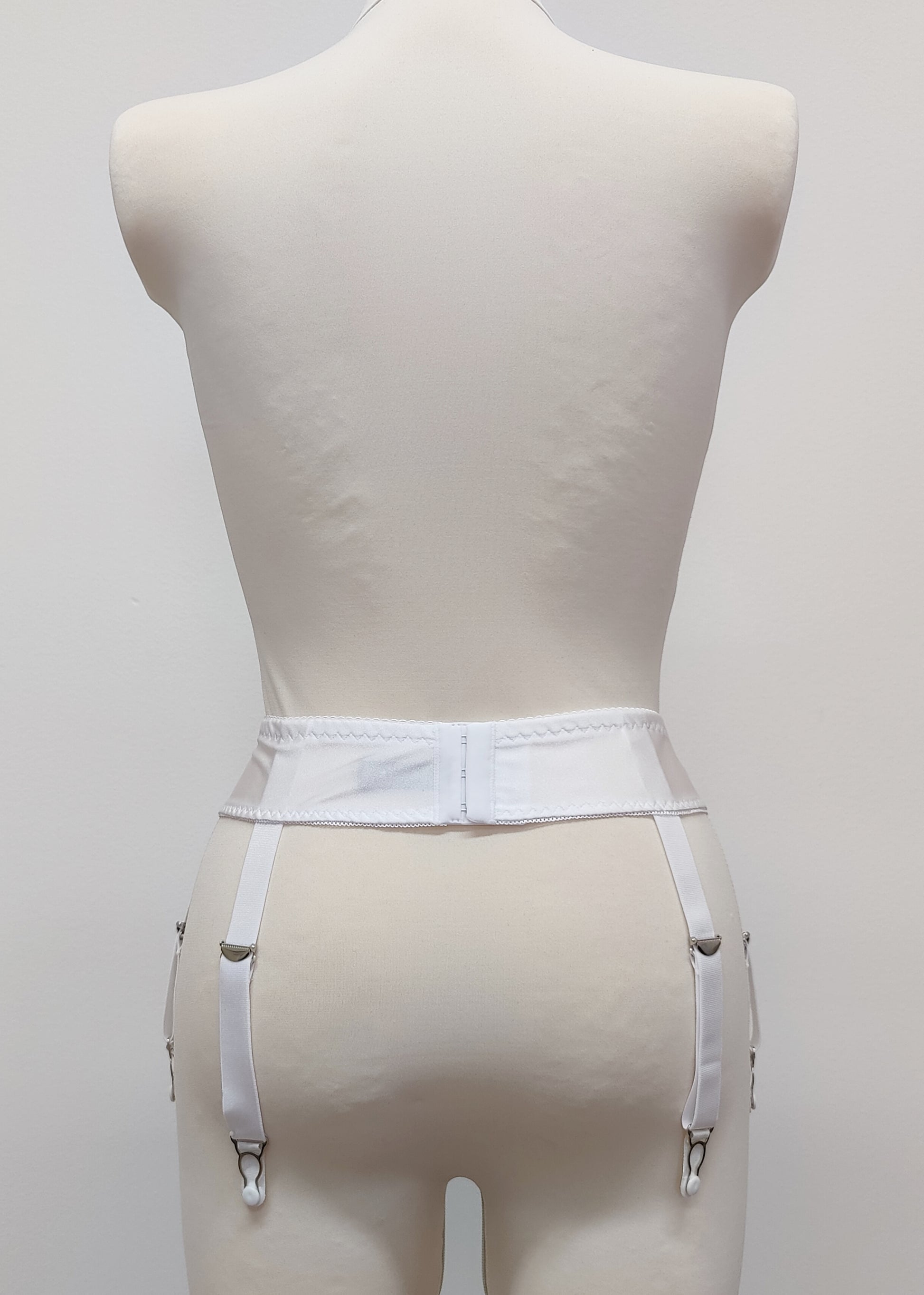 white narrow 60's style Summer garter belt with 6 straps, back view