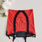 sunset red Rhonda open bottom girdle, with black lace trim on the front and 6 black straps