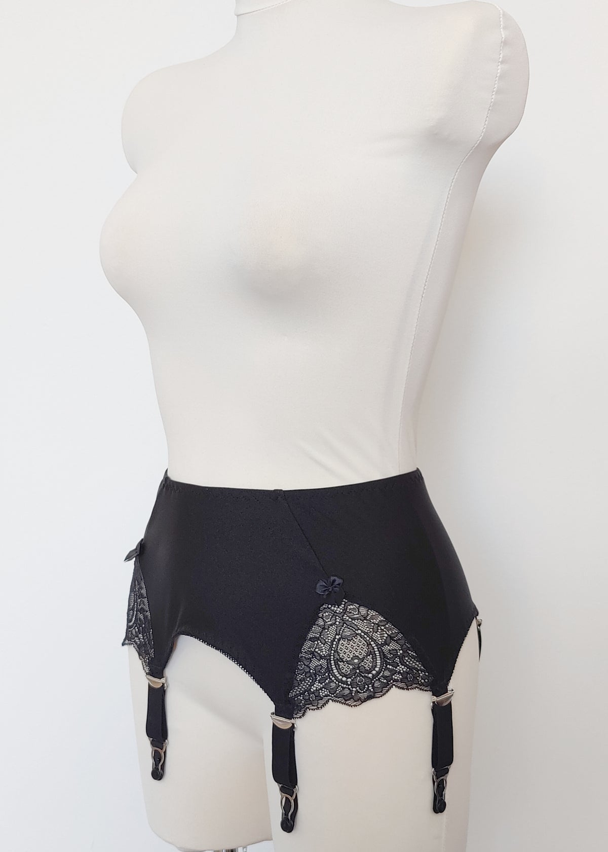 black, retro style, 6 strap Scarlett garter belt with black straps and lace side inserts, side view