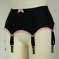 black 6 strap garter belt with pink ruffle trim