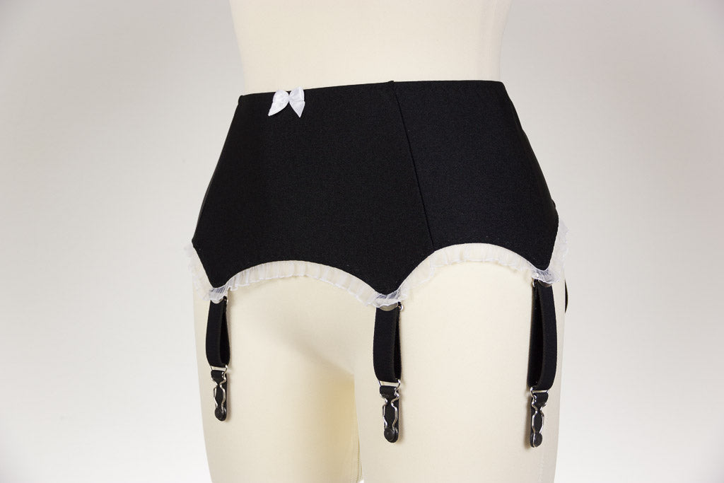 black 6 strap garter belt with white ruffle trim