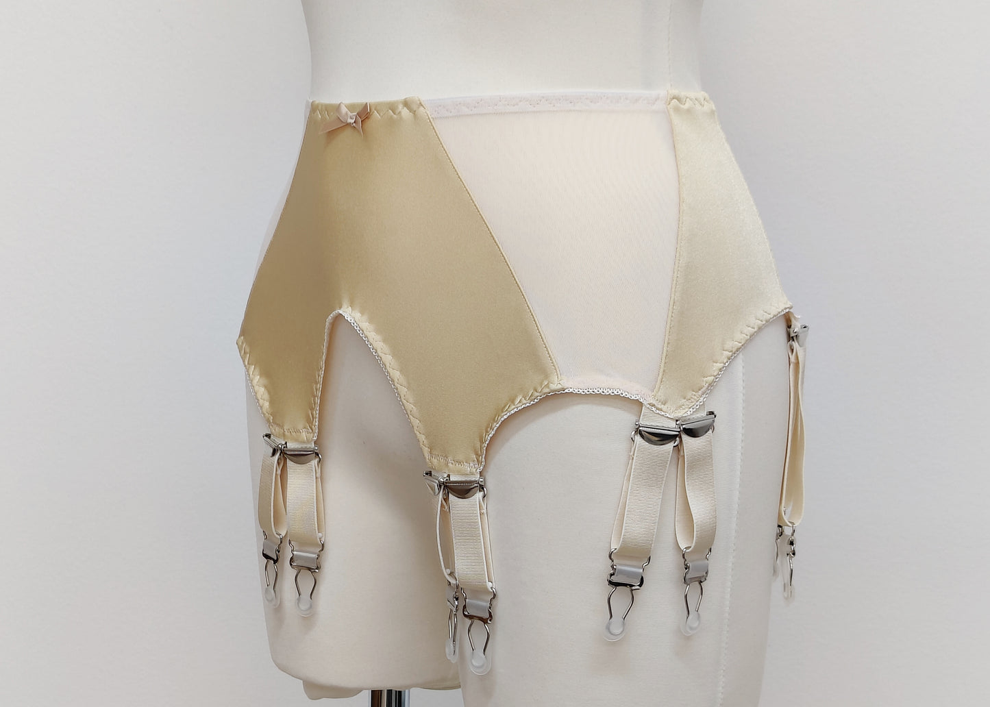 beige wide 12 strap Stella garter belt, side view