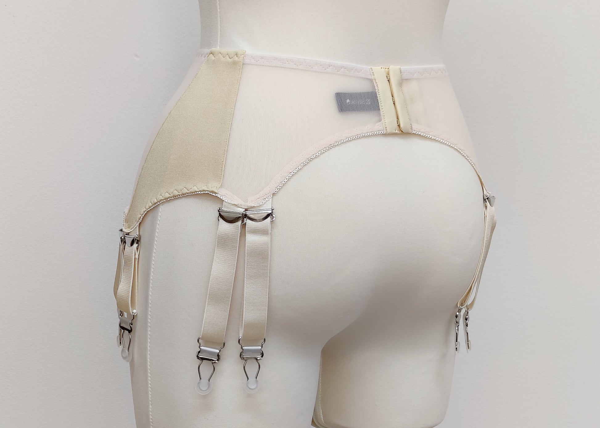 beige wide 12 strap Stella garter belt, back view