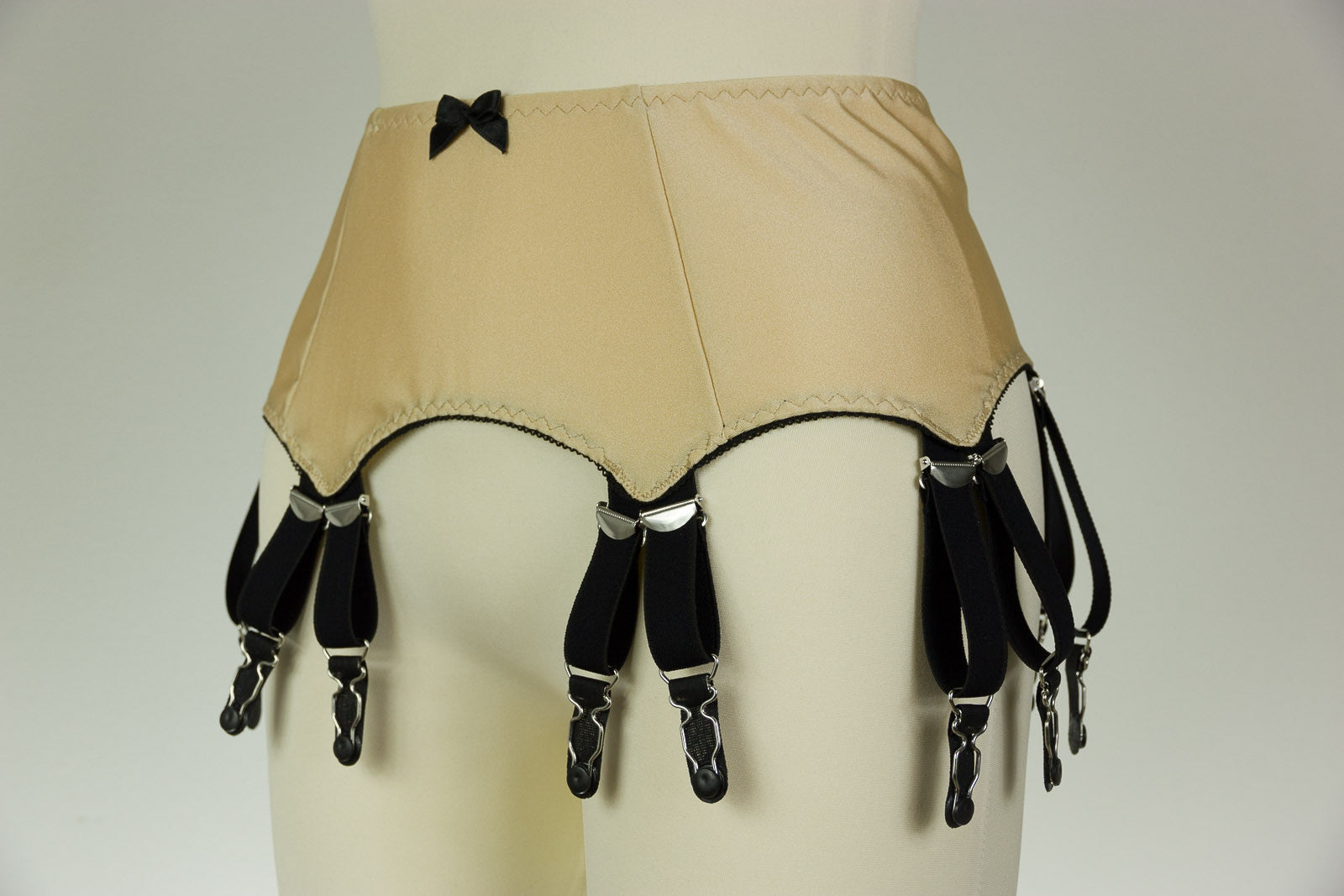 beige and black 12 strap garter belt